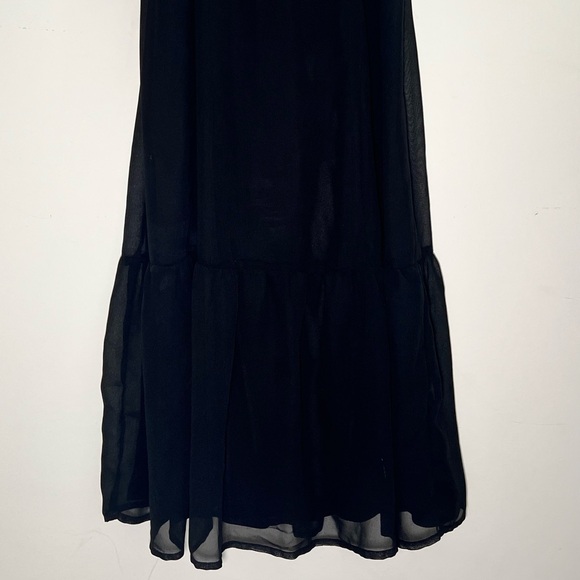 Fitted black spaghetti strap dress and corset and ruffle detail and tiered skirt - Picture 2 of 8